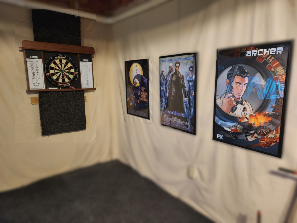 Challenge a friend to darts as the maps are getting set up.